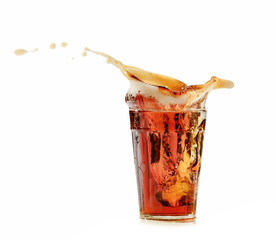 cola glass and cola splashing