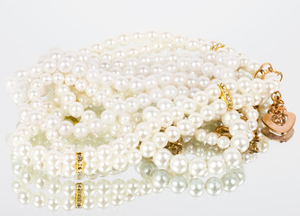 Pearl jewelry on white background