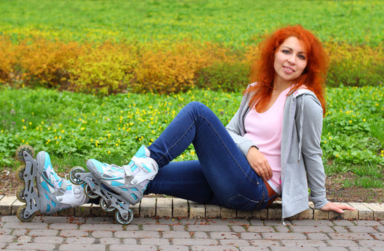 Relaxing ginger girl on skates