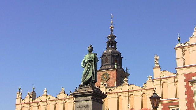 Poet Adam Mickiewicz and Town Hall Tower, Krakow, Poland