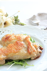 French cuisine, grilled chicken with baby leaf salad