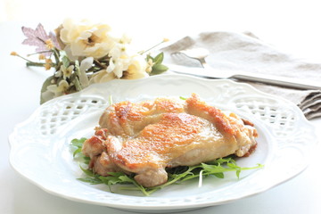 French cuisine, grilled chicken with baby leaf salad