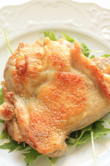 French cuisine, grilled chicken with baby leaf salad