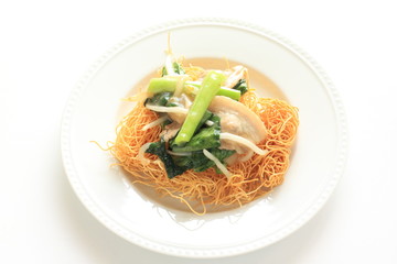 Chinese fried noodles with stir fried vegetable and pork