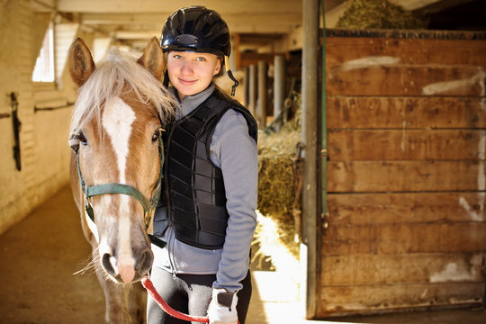 Girl with horse - Powered by Adobe
