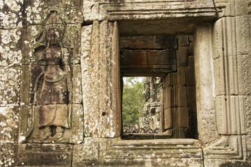 Fototapeta na wymiar Devata and Window, Bayon Temple, Angkor Wat, Cambodia