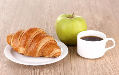 Classical breakfast. Coffee and croissant