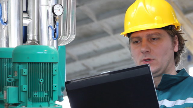 Industrial worker with notebook