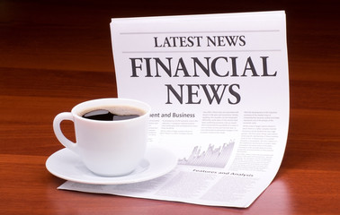 The newspaper LATEST NEWS.with the headline  FINANCIAL NEWS