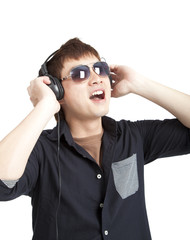 portrait of young man with glasses and headphones