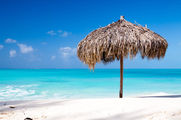 Beach Umbrella on a perfect white beach in front of Sea