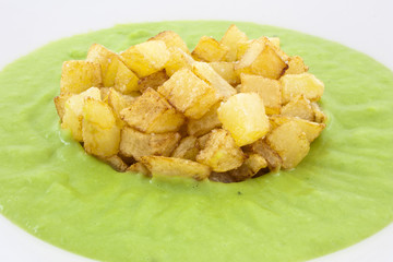 fried potatoes with pea cream