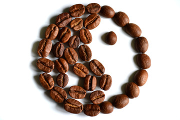 Yin-yang symbol made of coffee beans