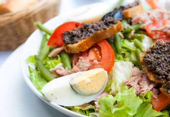 Fresh salmon salad with tomatoes
