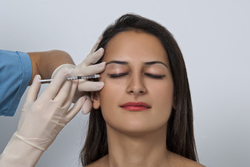 Cosmetic botox injection in the female face