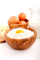 Milk, flour and eggs, ingredients for baking.