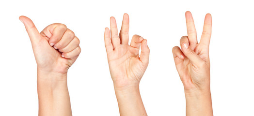 Three hands making the sign of Ok