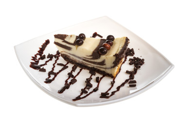 cheesecake with chocolate sauce.