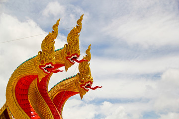 three heads gold naga in thai temple