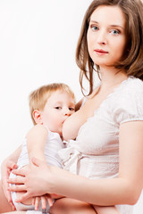 Mom is breastfeeding, on a gray background
