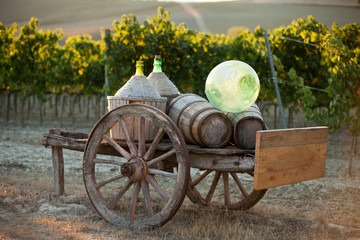 A cart loaded with wine bottles