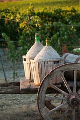 A cart loaded with wine bottles