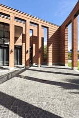 modern bricks house,  patio with columns