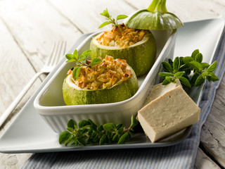 Zucchinis stuffed with tofu cheese, vegetarian food