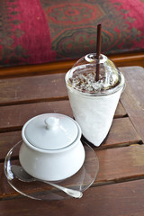 Ice coffee with sugar cup