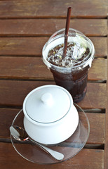 Ice coffee with sugar cup