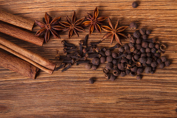 Frame composition of spices on wood,anise,cinnamon,laurel