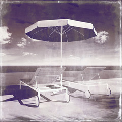 Vintage old grungy summer pool , umbrella lounge holiday