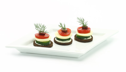 Canape with cheese and vegetables/