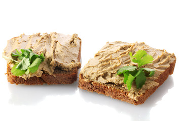 Fresh pate on bread isolated on white