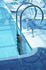 Pool ladder in water