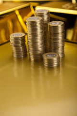 Coins and gold bars, Finance Concept