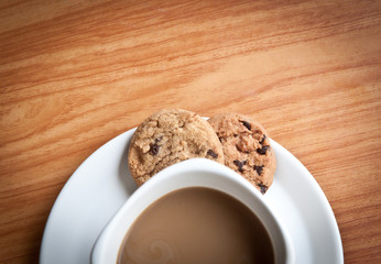 coffee cup with cookie.