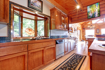 Large kitchen lof cabin house interior.