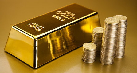 Coins and gold bar, Finance Concept