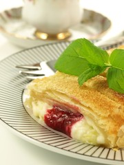 Strudel with cherry, closeup