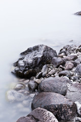 Fototapeta na wymiar Stones in water