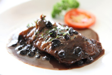Duck confit , Roasted duck with blueberry sauce