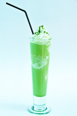 Milk shakes with green tea isolated on white