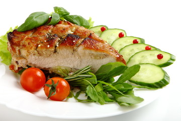 Glazed Roast Pork with vegetables isolated on white background.