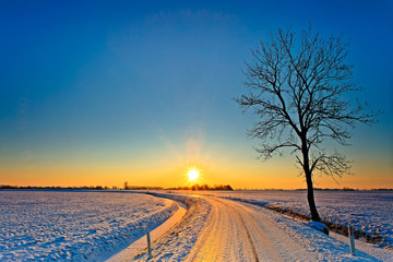 Sunset in a white winter landscape