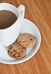 coffee cup with cookie .
