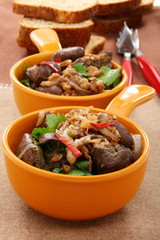 Chicken liver with onion and walnuts.