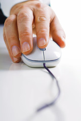 close-up hand with computer mouse