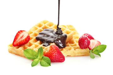 belgium waffles with strawberries and mint  isolated on white