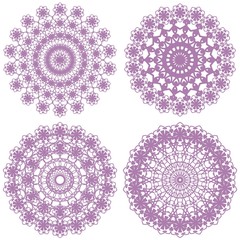four different lace patterns on white